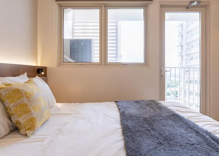 Apartment Modern At Park Mckinley West With Wi-fi And Washer Manila